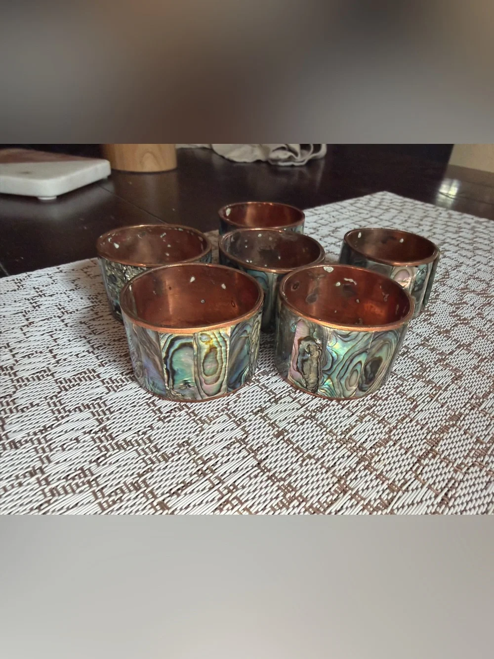 Copper and abalone shell napkin rings